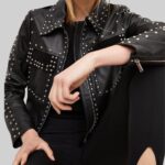 Closeup of the intricate-stud detailing on the leather jacket