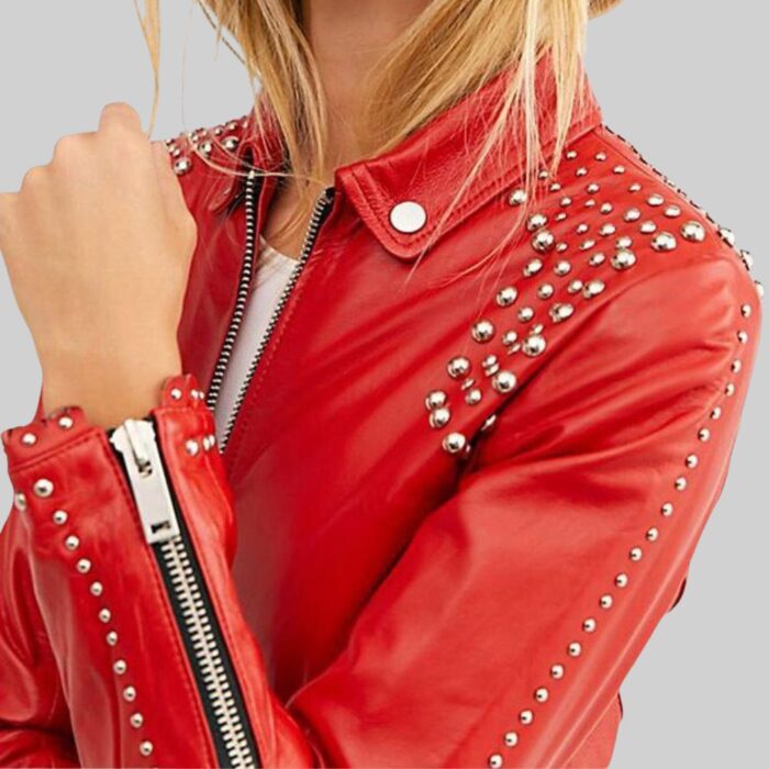 Closeup of the stud details on the front of the red leather jacket