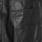 Back pocket closeup-of relaxed men's leather trousers