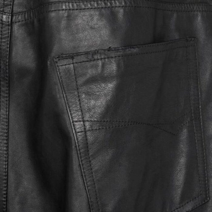 Back pocket closeup-of relaxed men's leather trousers