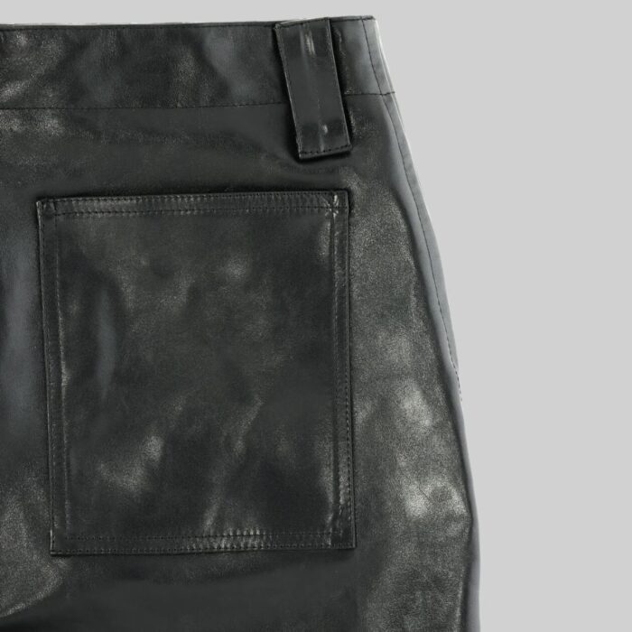 Closeup of back pocket-on mens leather cargo shorts