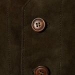 Closeup of buttons-on goatskin suede vest