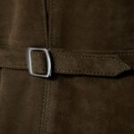 Closeup of the belt-on goatskin suede vest