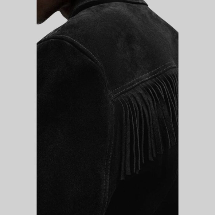 Detailed closeup-of a mens jacket with suede fringes