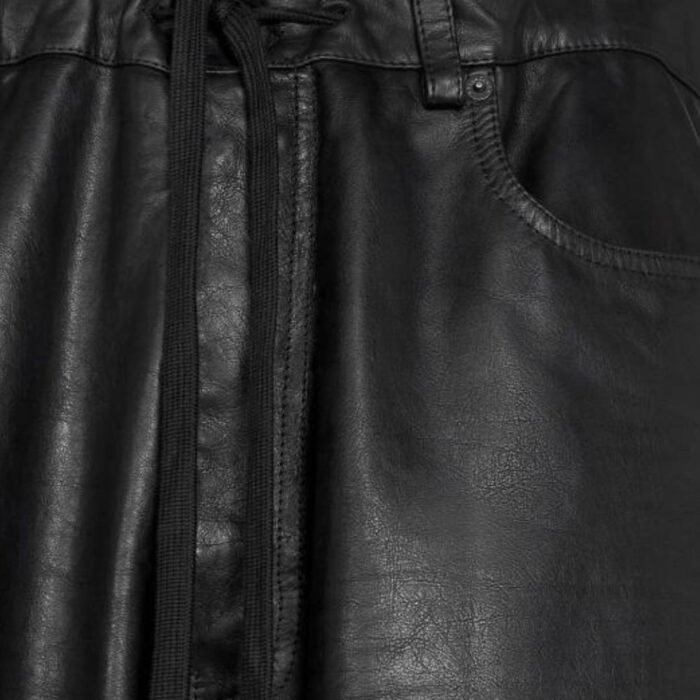 Front pocket closeup-of relaxed men's leather trousers