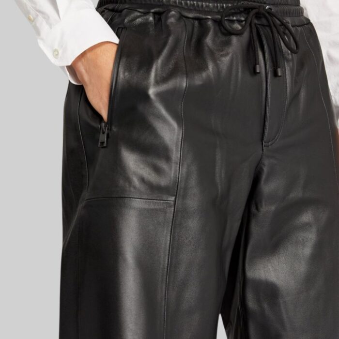 Side view of-mens black leather shorts