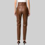 Back view of-women brown leather pants