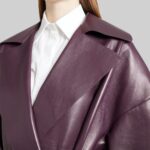 Closeup of the collar on the-womens purple leather jacket