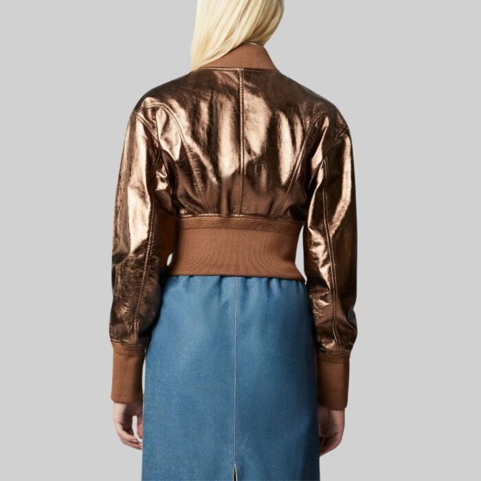 Back view of-women's cropped leather bomber jacket with model