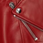 Close-up of zipper on-red leather moto jacket